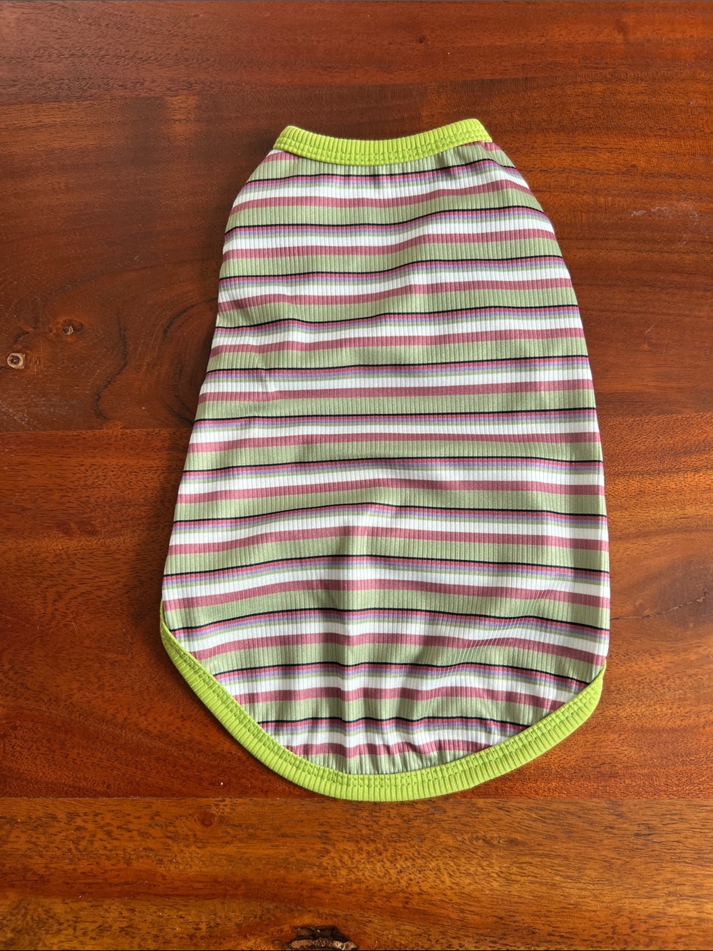 Striped sleeveless dog shirt.